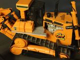 a toy bulldozer that is sitting on a table
