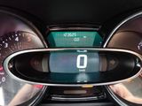 a close up of a car dashboard with a speedometer