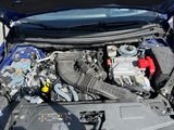 the engine of a car with its hood open and the hood open