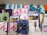 many different types of women ' s tights on the shelf