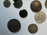 a lot of coins that are sitting on a table