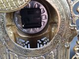 a close up of a clock with a clock face on it
