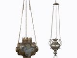 two antique brass hanging lamps with chains and a clock