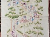 a picture of a cross stitched picture of a village