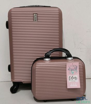 two pieces of luggage sitting next to each other