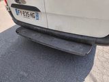 a white van parked on the side of the road