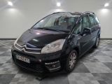 a picture of a black citrole parked on a checkered floor
