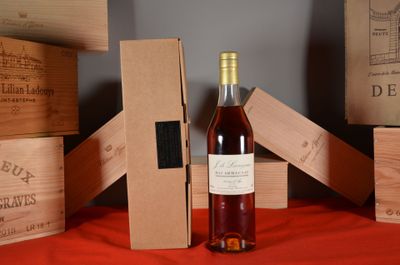 a bottle of wine that is sitting on a table