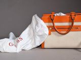 a bag and a pair of shoes next to a bag