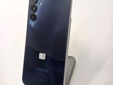 the back of a blue samsung galaxy s9 with a camera attached to it
