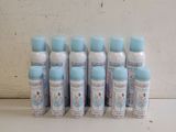 six bottles of deodorance are lined up on a counter