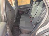 the back seats of a car are empty and the passenger seat is empty