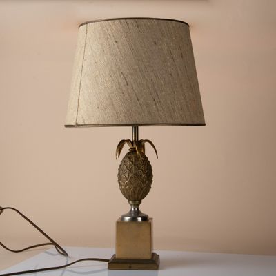 an image of a lamp on a table with a lamp shade on top of it