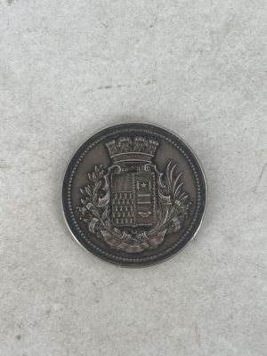 an image of a coin with a coat of arms on it