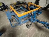 a picture of a machine that is sitting in a garage