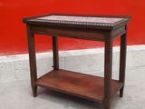 an image of a wooden table with a shelf on top of it