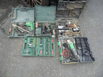 a lot of tools that are sitting on the ground