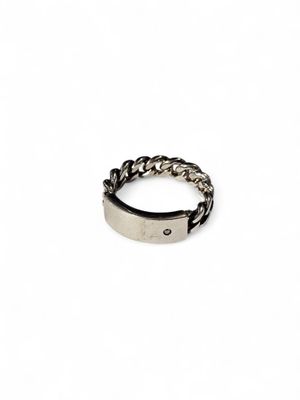 a close up of a ring on a white background