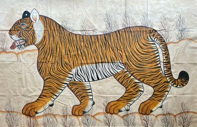 a painting of a tiger on the wall of a building