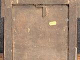 an old wooden picture frame with a picture on it