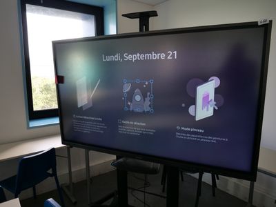 a large flat screen tv sitting in a room