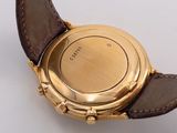an image of a close up of a watch on a white surface