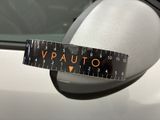 a car mirror with a sticker on it that says v - auto