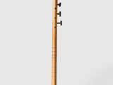 a bamboo flute with a wooden handle on a white background