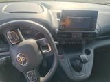 a dashboard of a car with a steering wheel and a dash board