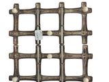 a close up of a wooden wine rack on a white background