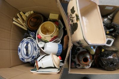 a cardboard box filled with many different types of items