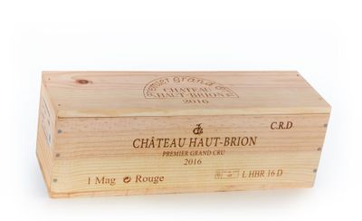 a wooden box with a label on it that says chateau haut - brion