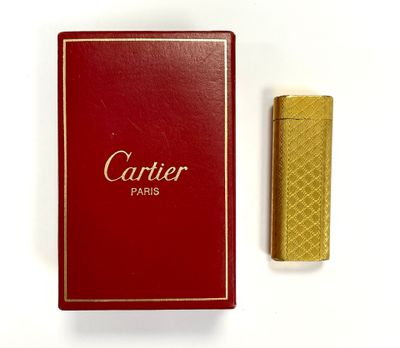 an image of a red box with a gold lighter next to it