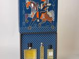 an image of a blue box with a picture of a man riding a horse on it