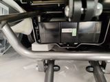 underside view of a vehicle with a box on the back of it