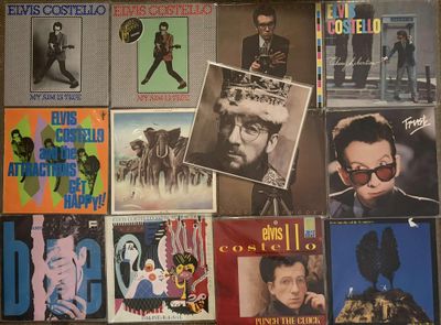 many different types of vinyl records on the wall