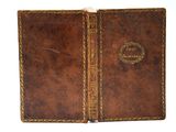 un vieux livre en cuir, orné d'une bordure dorée et doté d'une couverture marron