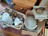a box of assorted items sitting on the floor