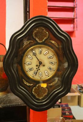 a clock that is hanging on the wall in the room