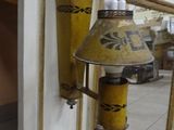a lamp that is on the side of a wall