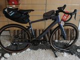 a bike that is parked in front of a wall