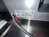 a close up of a machine that has a cord attached to it