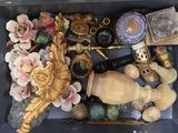 a box full of assorted items sitting on a table