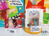 a bag of toys and a bag of books on a table