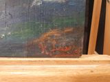 a picture of a painting that is on a shelf