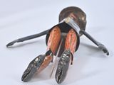 a pair of scissors and a bottle of wine on a table