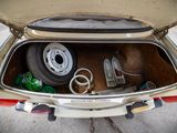 a car with a trunk full of stuff in it
