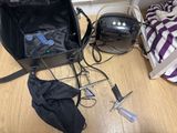 a black bag with a black handle and a black bag with a black handle and a black bag with a black handle and a black bag with a black