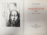 an open book with a drawing of a woman ' s face on it
