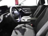 a picture of a car interior with a steering wheel and dashboard